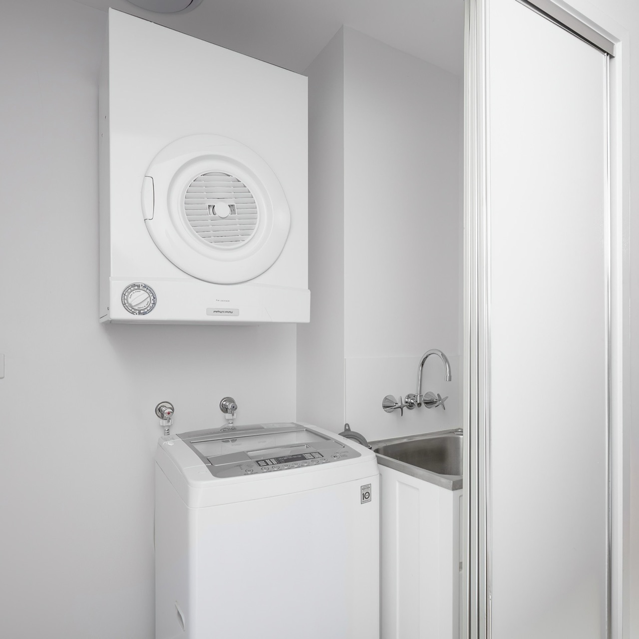 In-apartment laundry with washing machine, dryer and tub